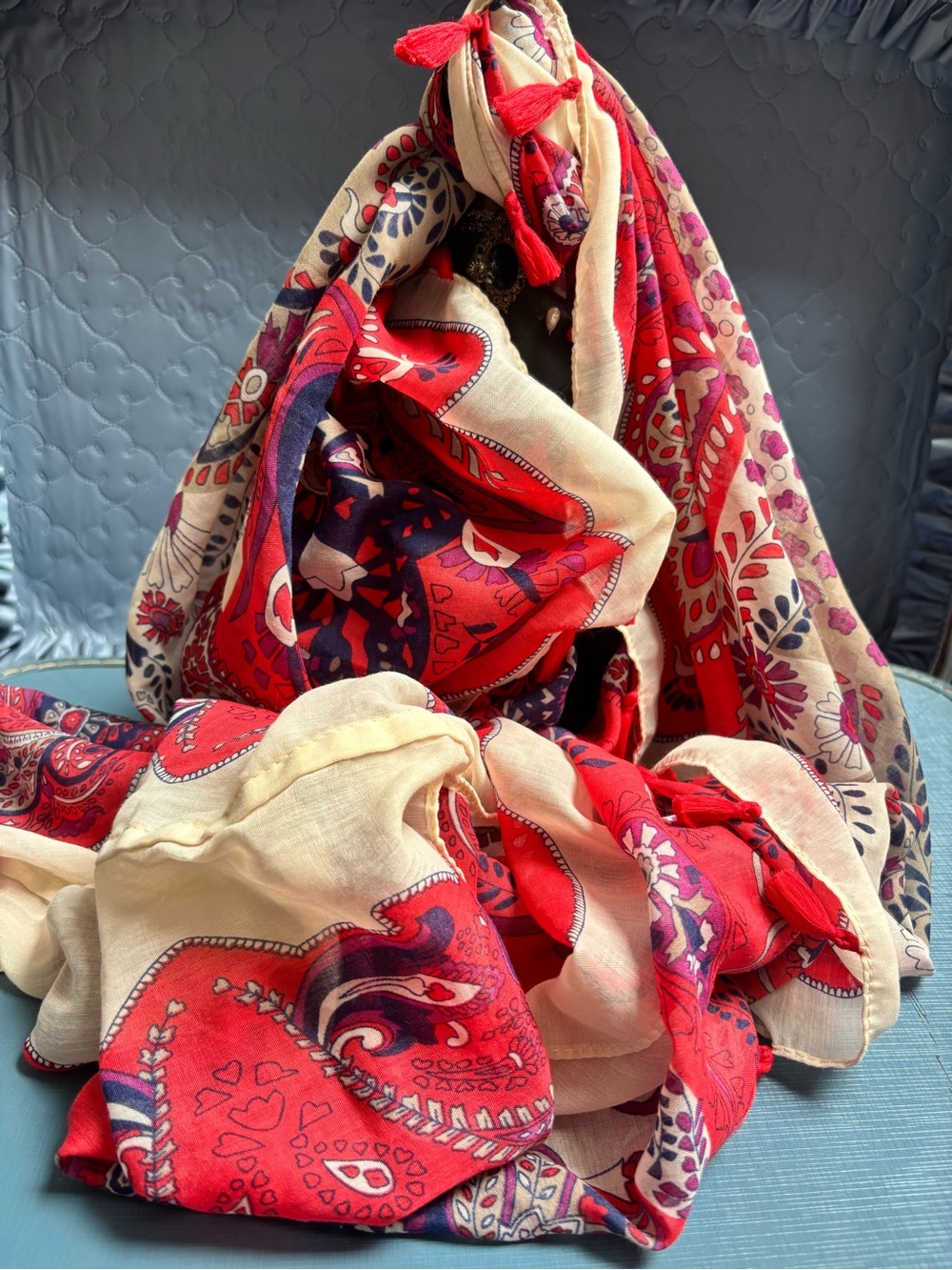 vintage paisley infinity scarf with tassel fringe in cream, red, and blue.